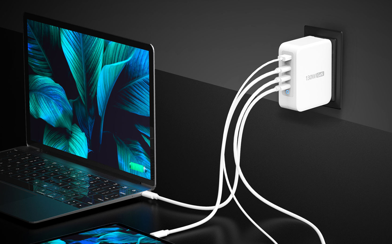 Charger charging Macbook and iPad