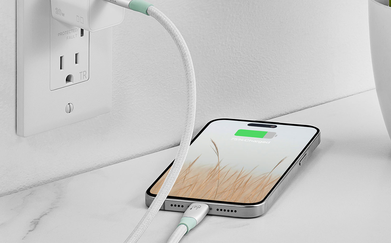 iPhone charging cable connected to a charger