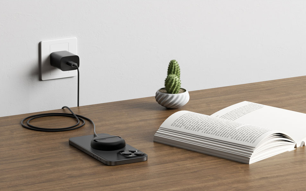 Wireless charger charging an iPhone