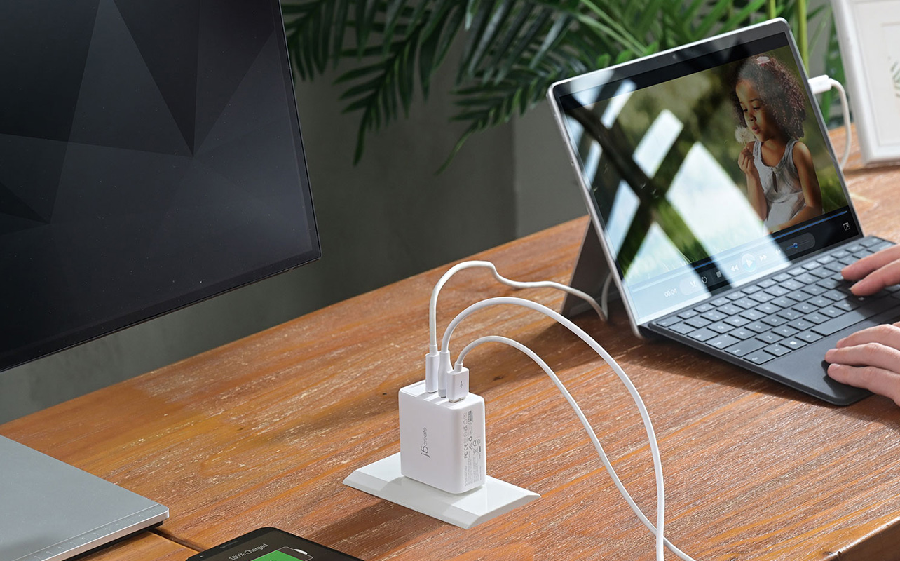Wall charger charging multiple devices
