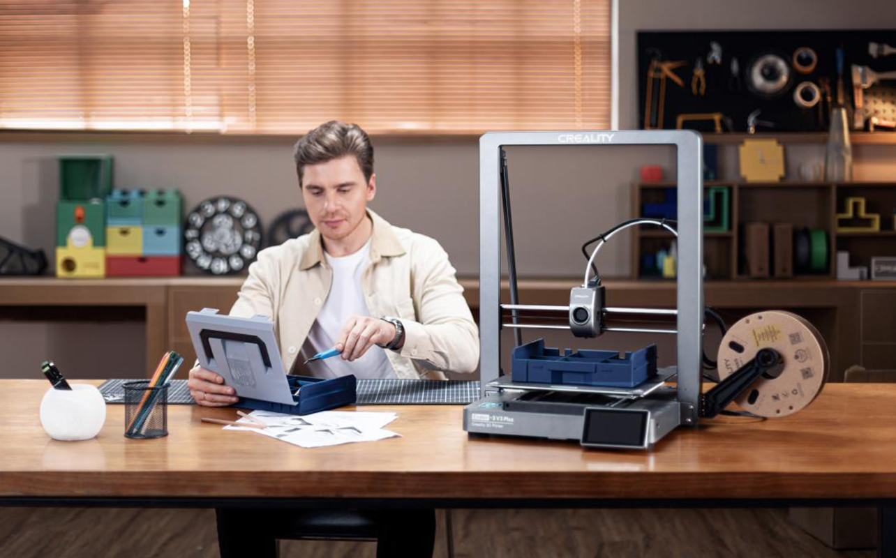 Creality Ender 3D printer on a table workshop at home.