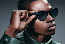 Stylish man wearing Ray-Ban Meta Gen 2 smart glasses.