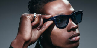 Stylish man wearing Ray-Ban Meta Gen 2 smart glasses.