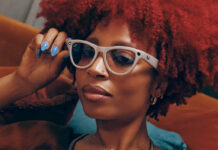 Woman wearing Ray-Ban Meta Skyler AI glasses.