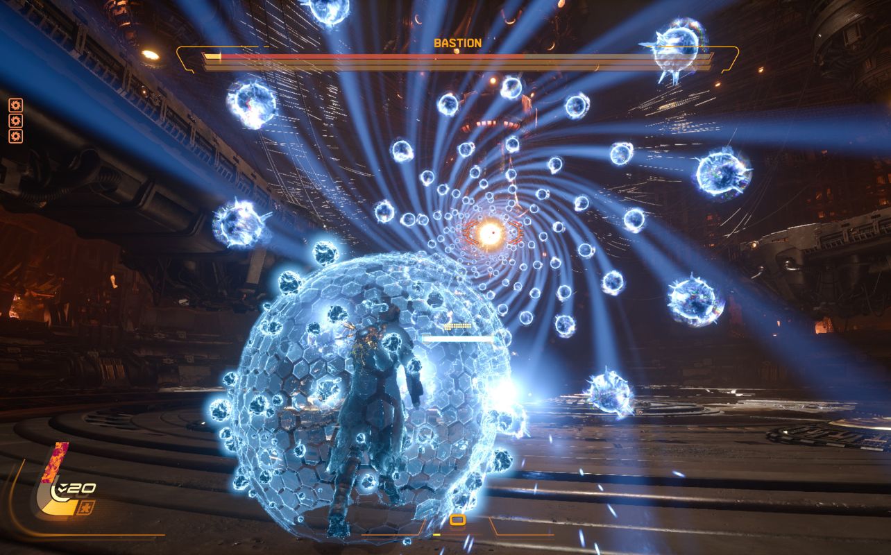 A spiral of projectiles rips toward a character cloaked in an energy shield.