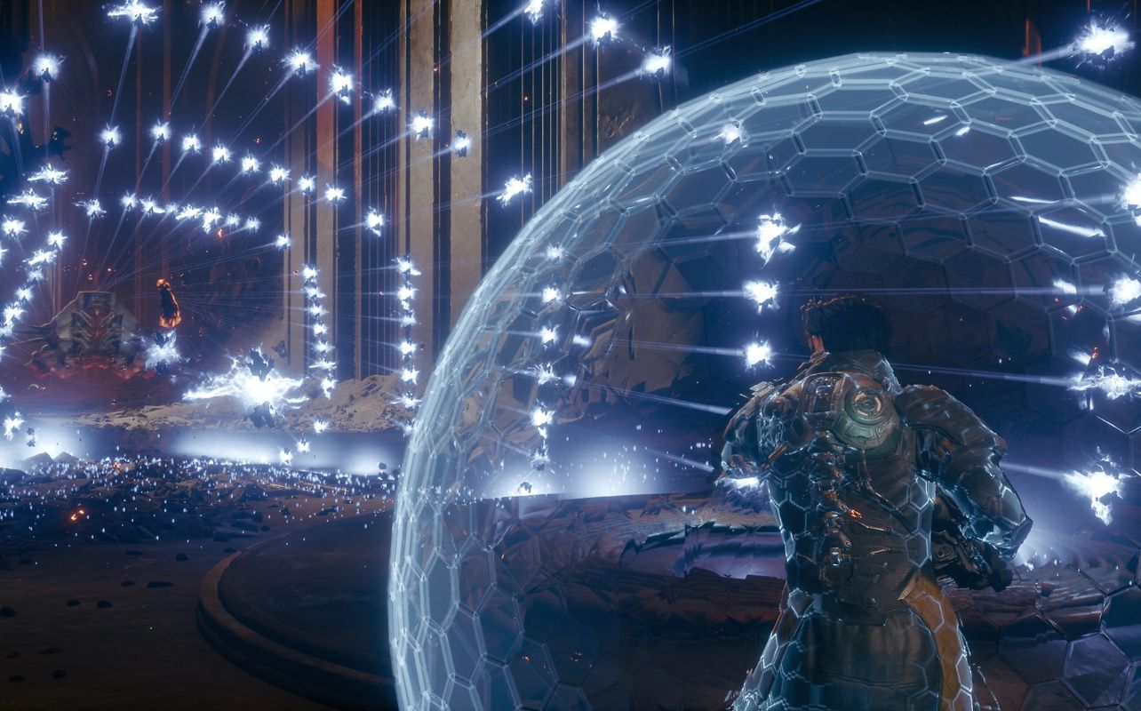 A giant bubble shield protects the user from glowing projectiles in the game Saros.