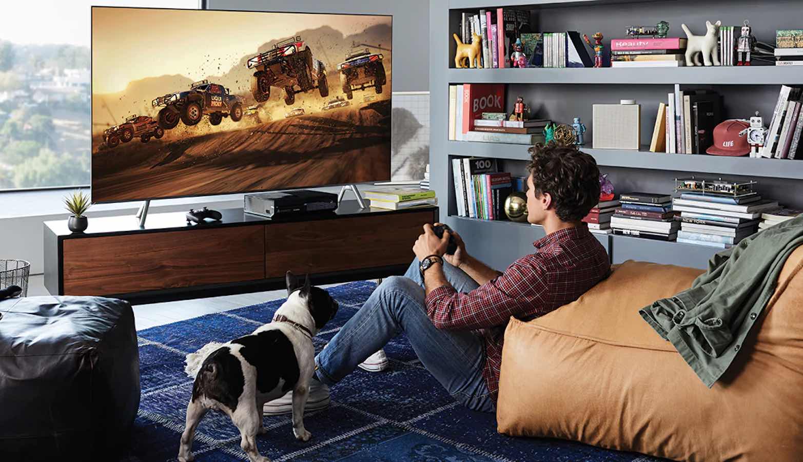 A person playing video game on a gaming TV