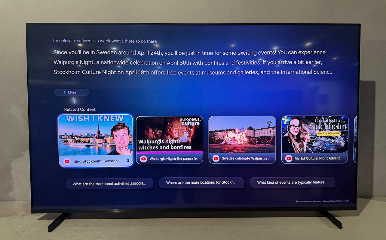 The Samsung R85H Micro RGB TV on a stand showing a a menu from the AI assistant.