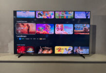 The Samsung R85H Micro RGB on a stand showing the menu.