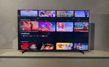 The Samsung R85H Micro RGB on a stand showing the menu.