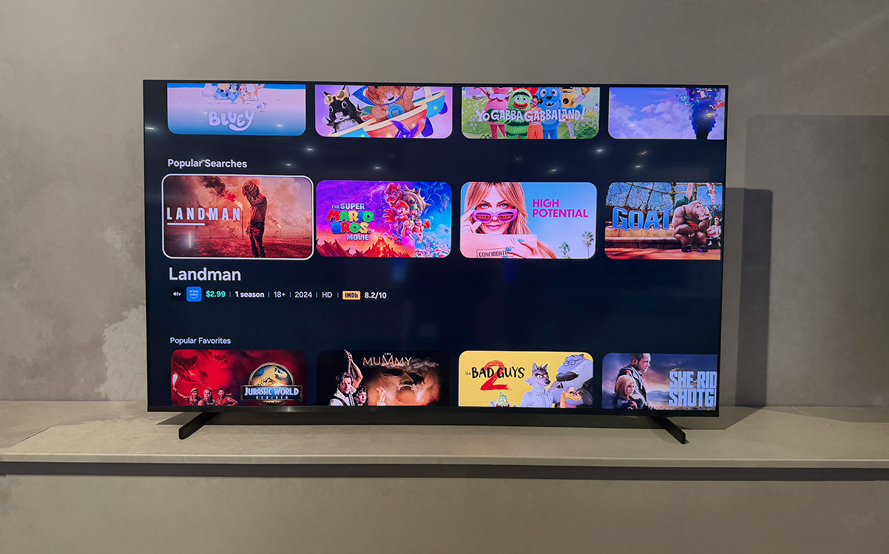 The Samsung R85H Micro RGB on a stand showing the menu.