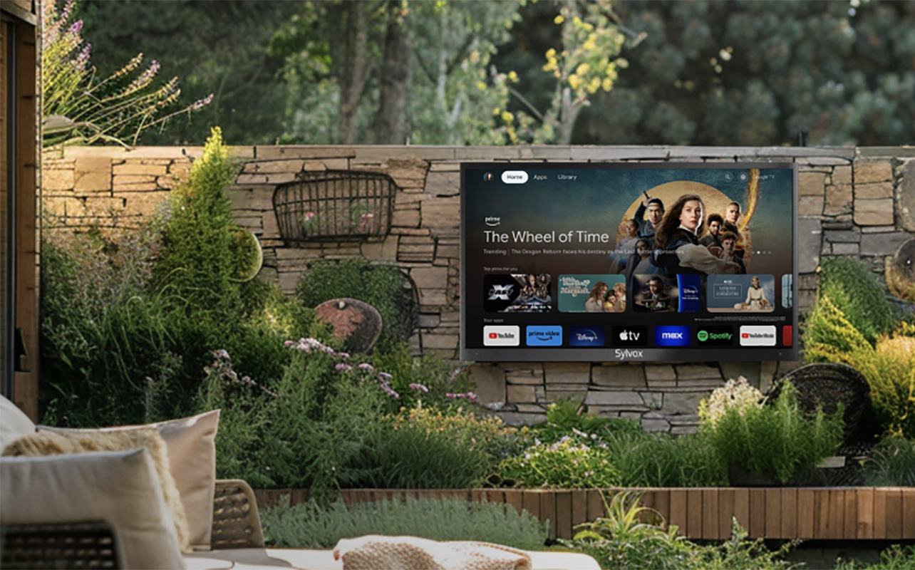 The Sylvox outdoor TV mounted in a garden.