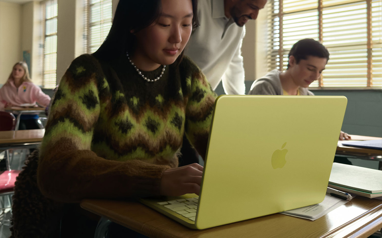 Student using a MacBook in class
