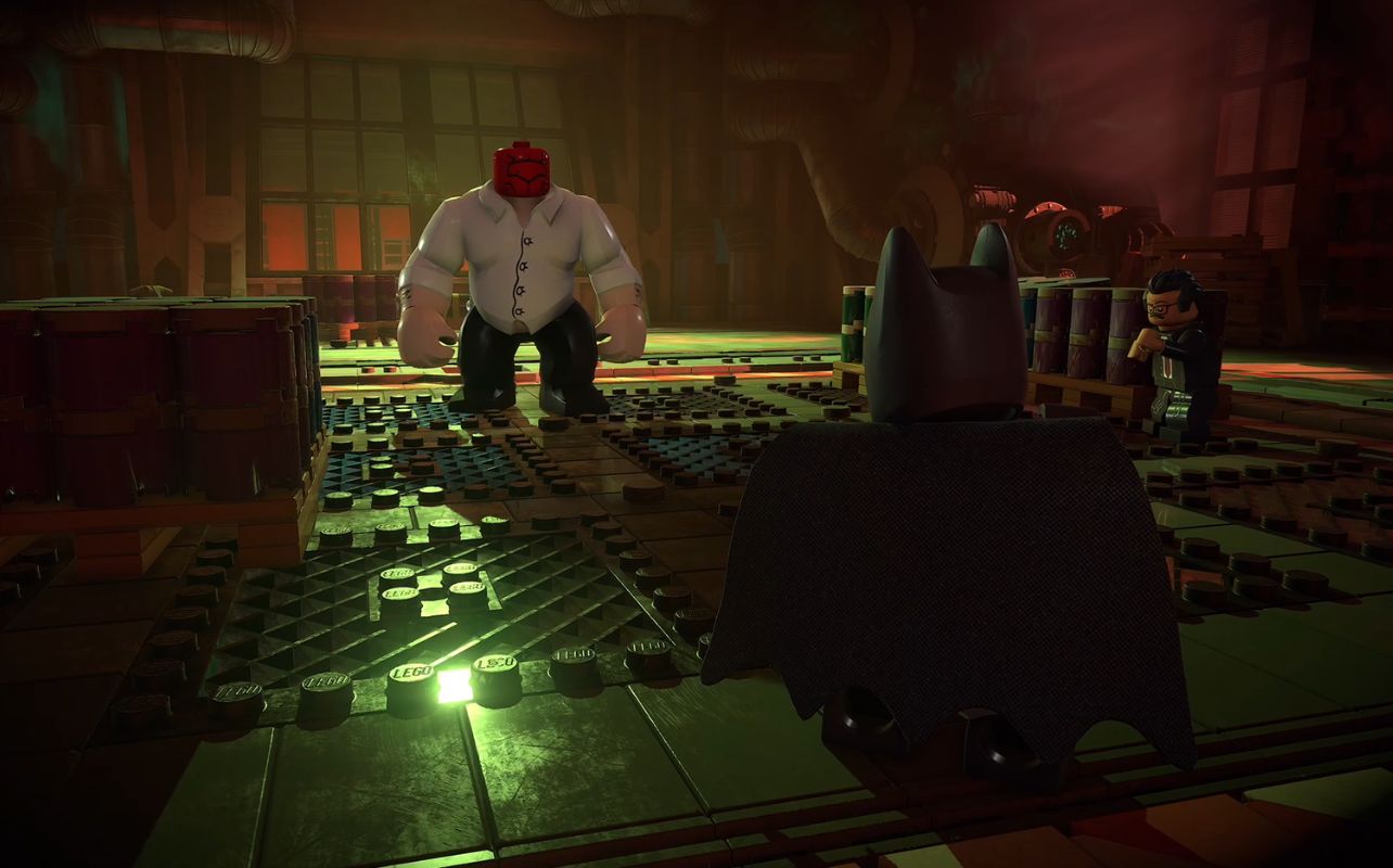 A screenshot of the Lego Batman: Legacy of the Dark Knight game with Batman facing an enemy.
