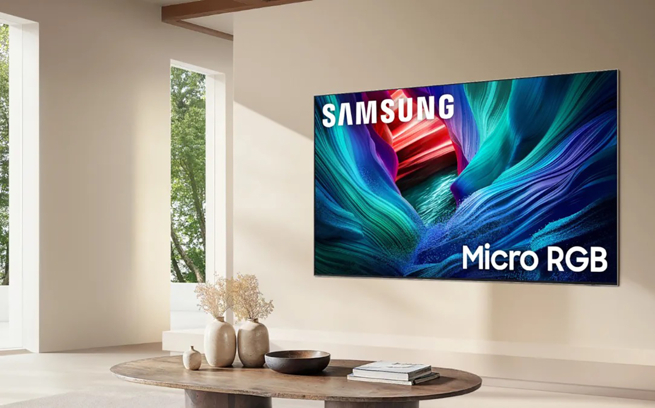 A Samsung RGB LED TV mounted on a wall in a living room.