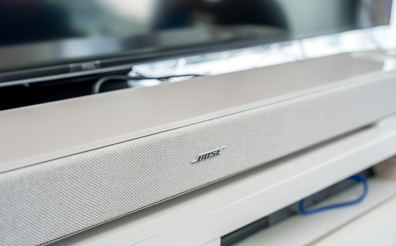 Bose Lifestyle Ultra Soundbar in front of a TV.