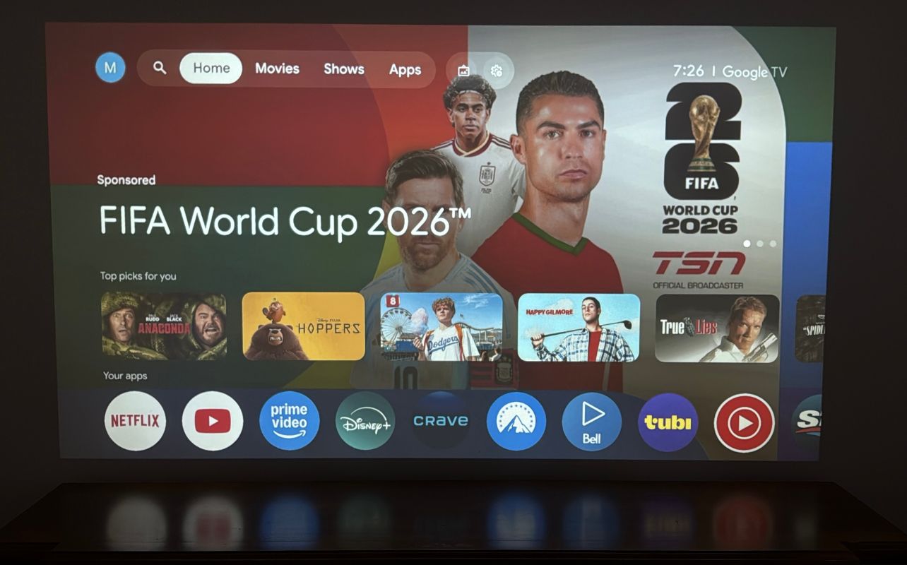 The Brother Eye Mark III Elite Smart LCD Projector's Google TV interface with World Cup 2026 graphics.