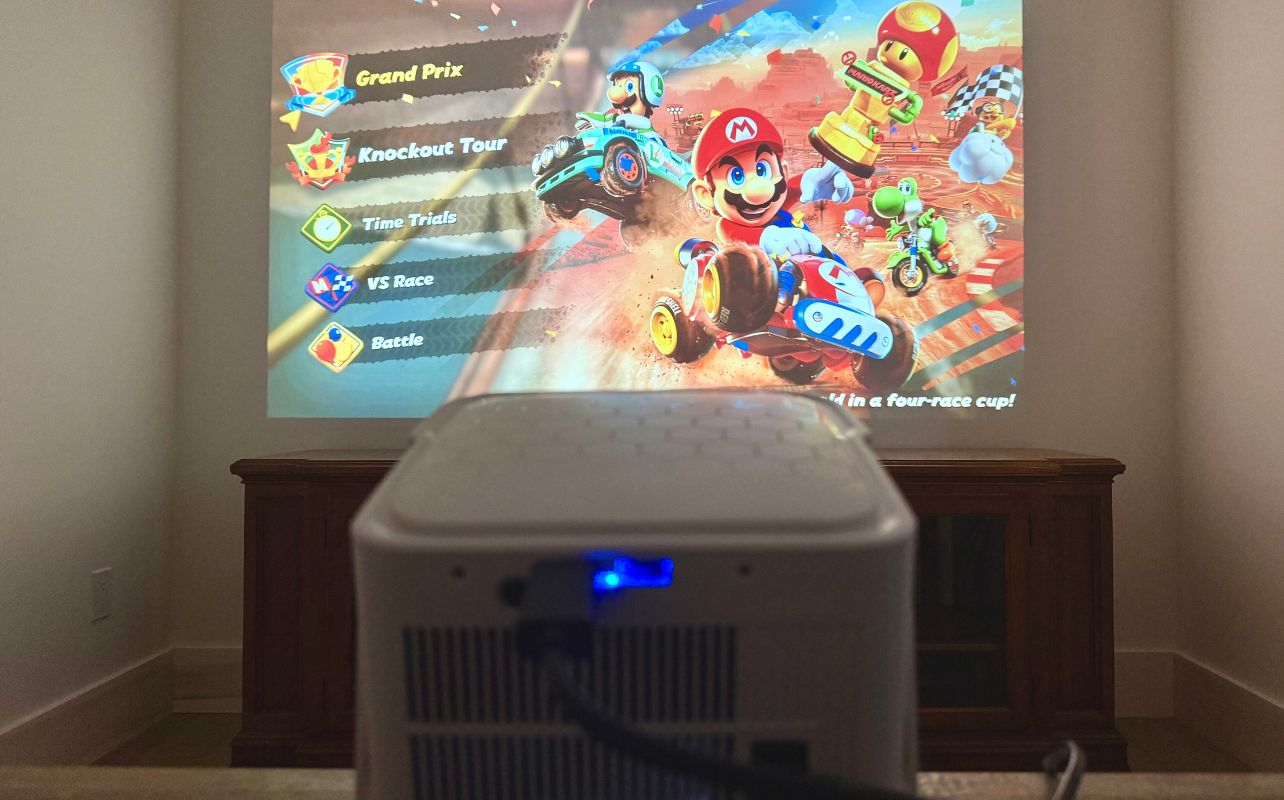 The Brother Eye Mark III Elite Smart LCD Projector is displaying Mario Kart World.