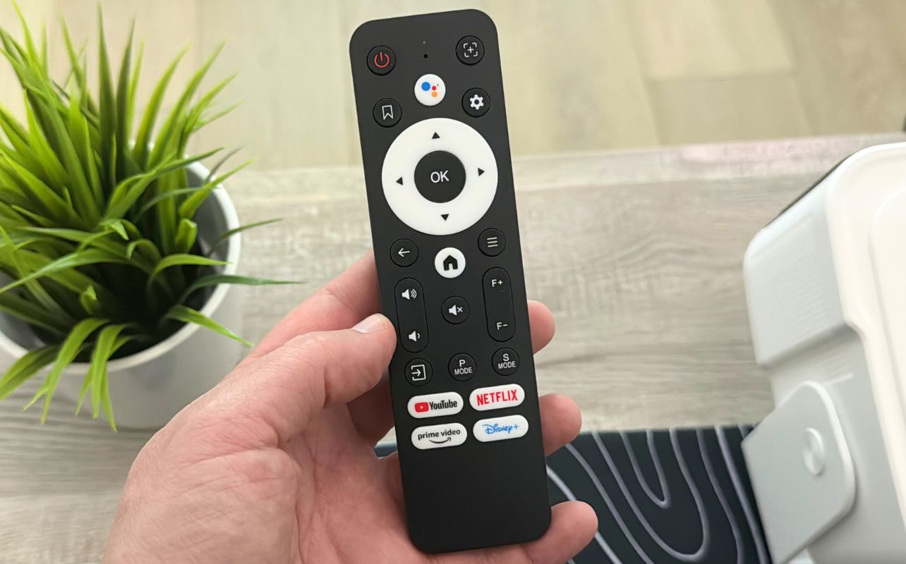 The Brother Eye Mark III Elite Smart LCD Projector's remote.