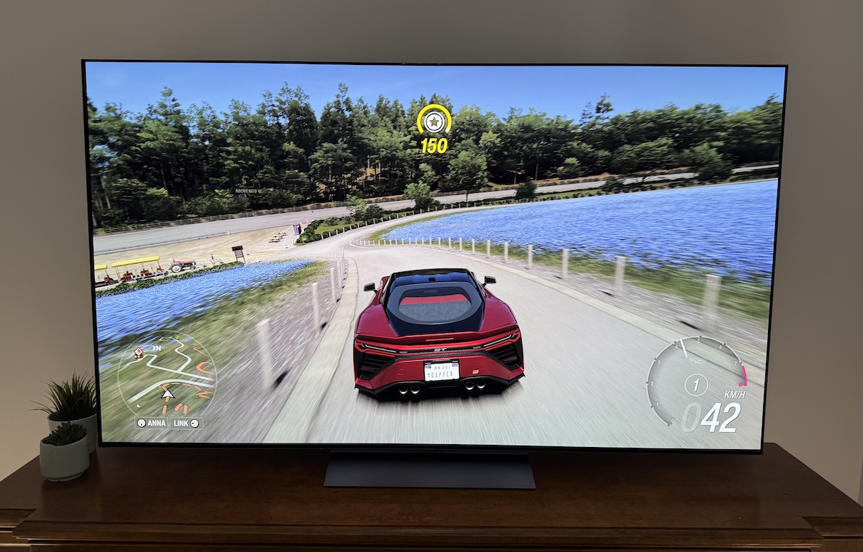 LG OLED 2026 C6H with a car game on screen