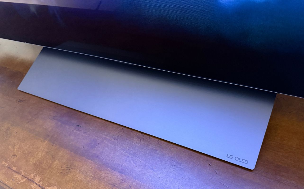 LG OLED 2026 C6H stand with LG OLED showing