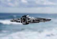 DJI Avata 360 in flight by the beach.