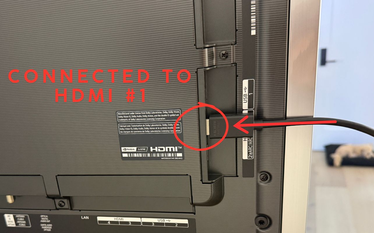 The Nintendo Switch 2's HDMI cable connected to the back of the LG G6 TV.
