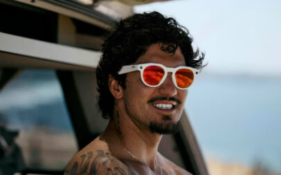 Man wearing Oakley Meta HSTN Smart Glasses outside.
