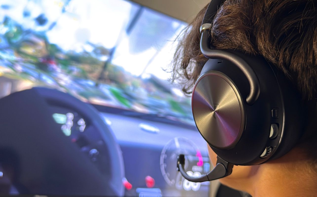 A person playing Forza Horizon 6 wearing the Turtle Beach Stealth Pro II headset.