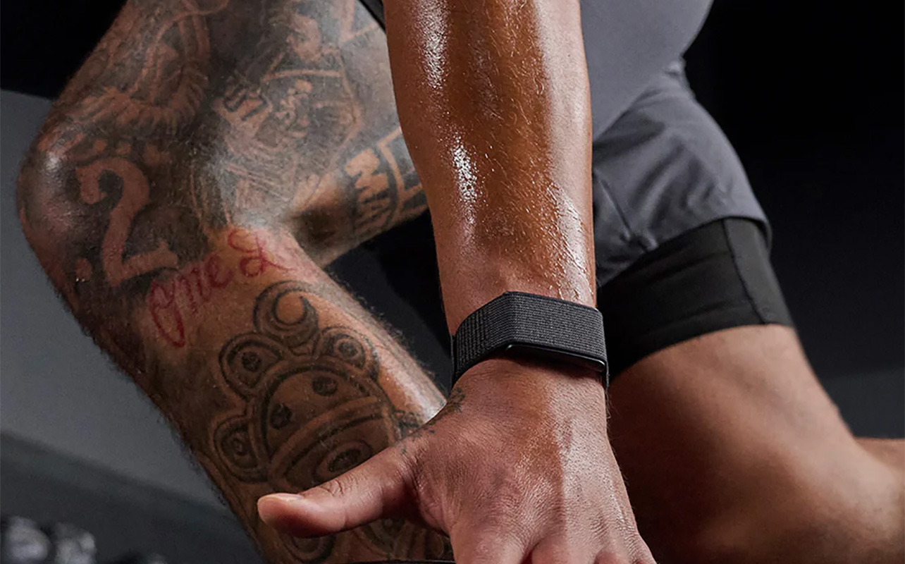 A man working out while wearing the Amazfit Helio Strap.