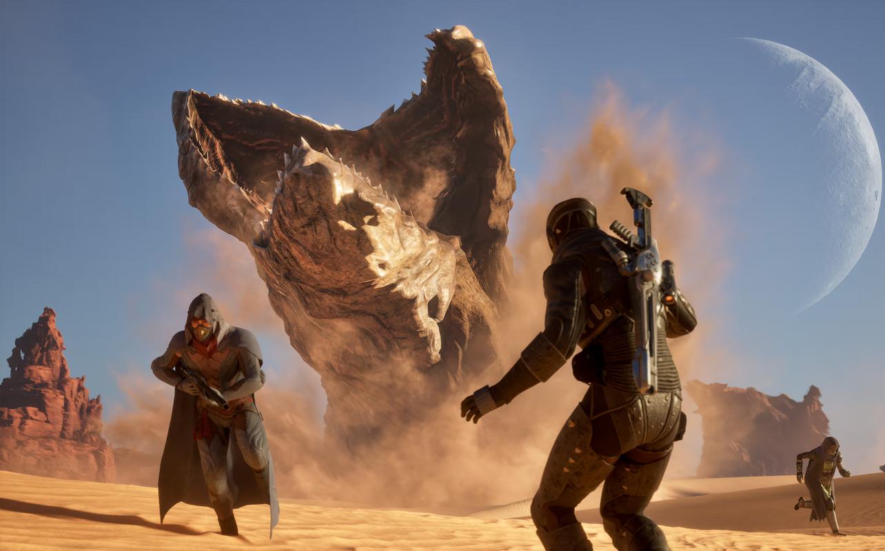Dune: Awakening image showing characters crossing the desert on Arrakis with a massive sandworm rising behind them.