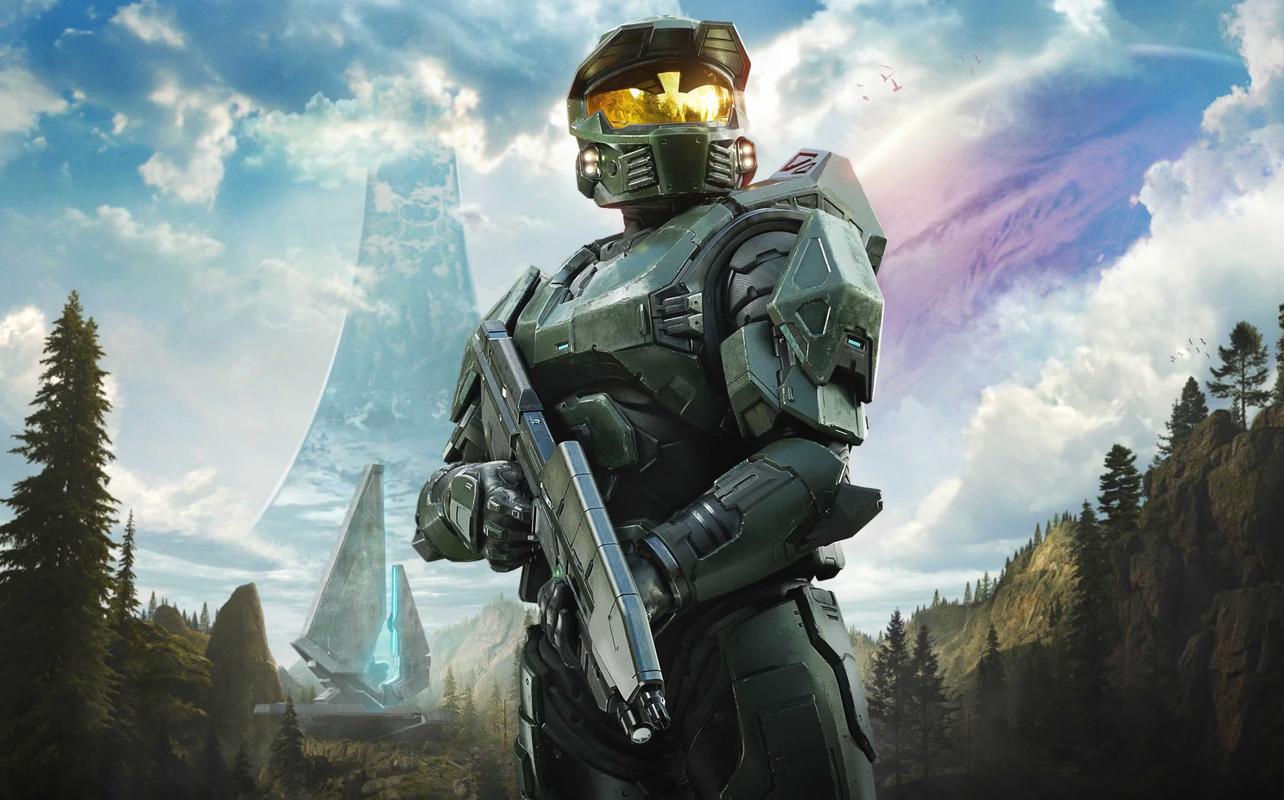 Master Chief standing in front of a Halo landscape in Halo: Campaign Evolved key art