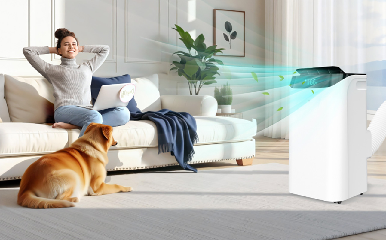 A woman relaxing in a living room with a Humhold portable air conditioner.