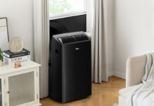 Midea Duo portable air conditioner venting out a window.