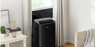 Midea Duo portable air conditioner venting out a window.