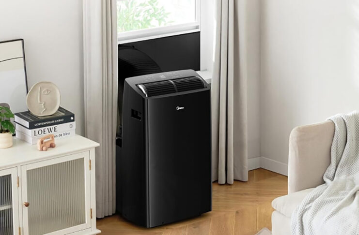 Midea Duo portable air conditioner venting out a window.