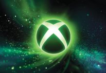 Glowing XBOX logo surrounded by green and blue particle effects on a dark background.