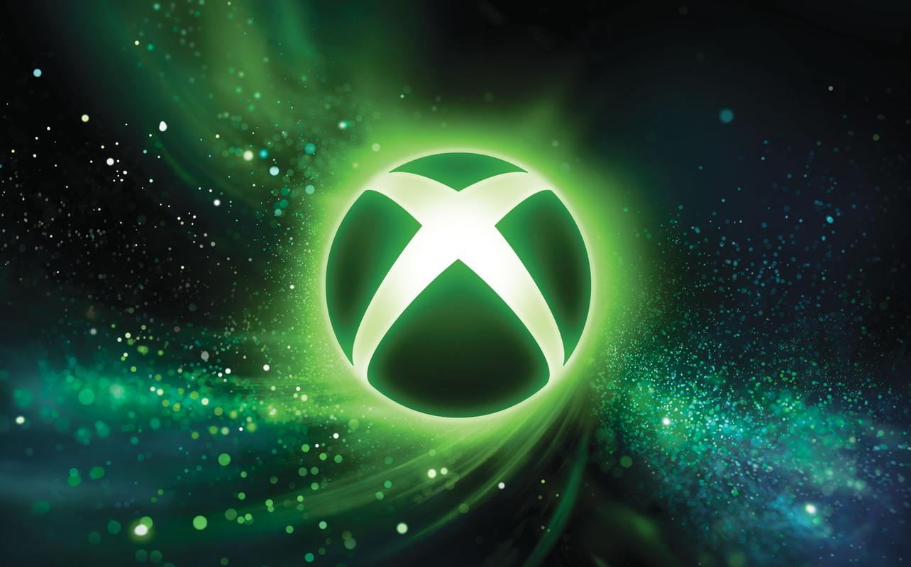 Glowing XBOX logo surrounded by green and blue particle effects on a dark background.