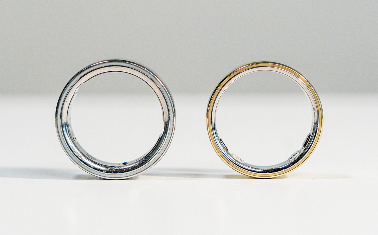 Oura Ring 4 next to Oura Ring 5 standing up.
