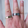 Oura Ring 5 compared to Ring 4 on right hand.