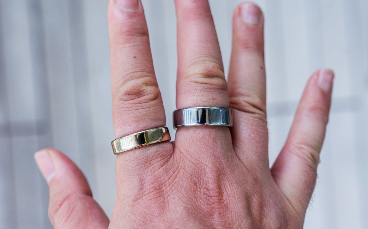 Oura Ring 5 compared to Ring 4 on right hand.
