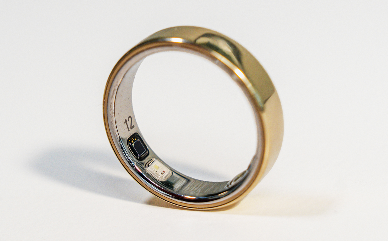Oura Ring 5 with exposed sensors.
