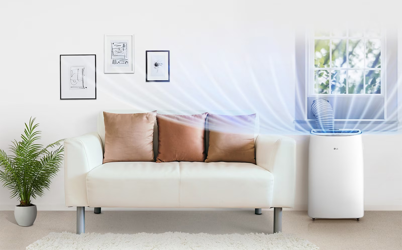 An LG portable air conditioner in a living room.