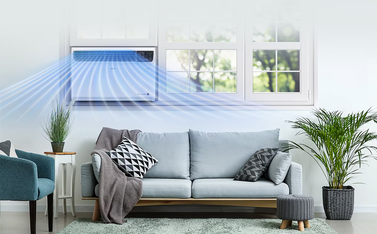 An LG window air conditioner in a living room with blue lines showing air coming from it.