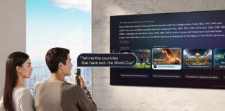 A couple using voice commands on a Samsung AI TV