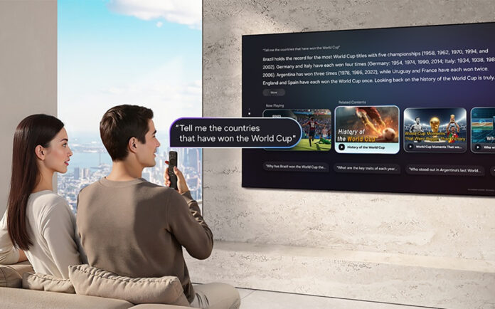 A couple using voice commands on a Samsung AI TV