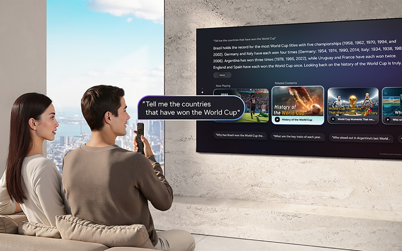 A couple using voice commands on a Samsung AI TV