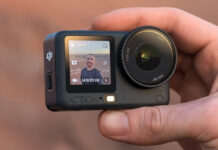 The DJI Osmo Action 6 captures adventure and plenty more Man holding DJI Osmo Action 6 at himself outdoors.