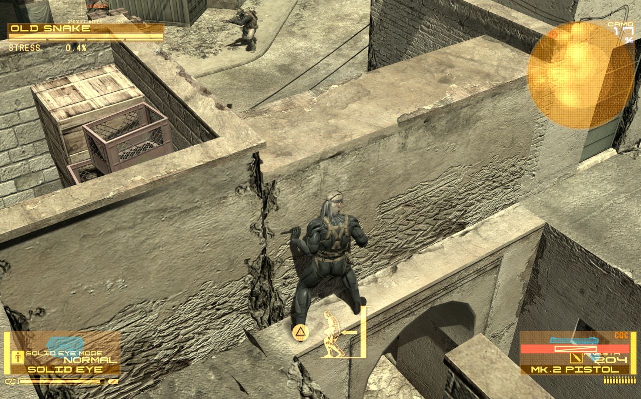 Metal Gear Solid Master Collection Vol. 2: Solid Snake is shimmying across a ledge.