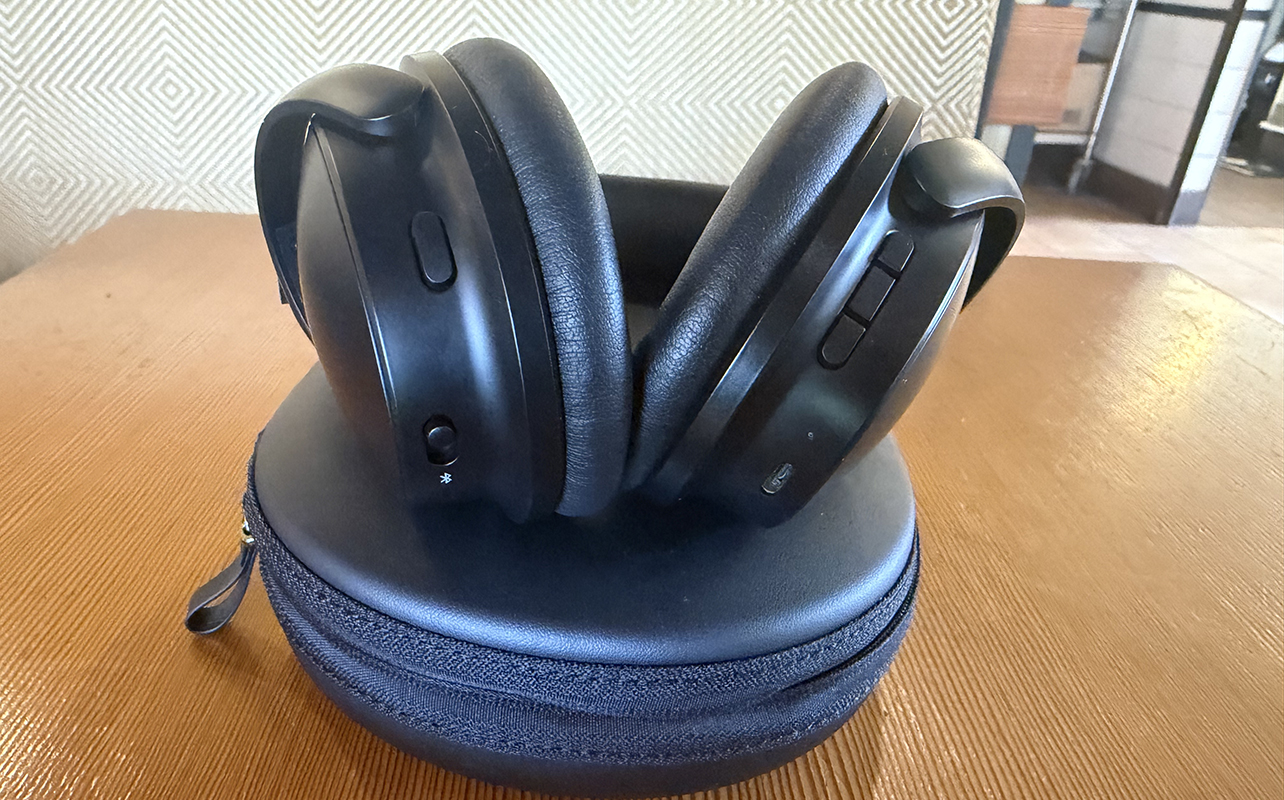 The Bose QuietComfort 2 headphones sitting atop their case.